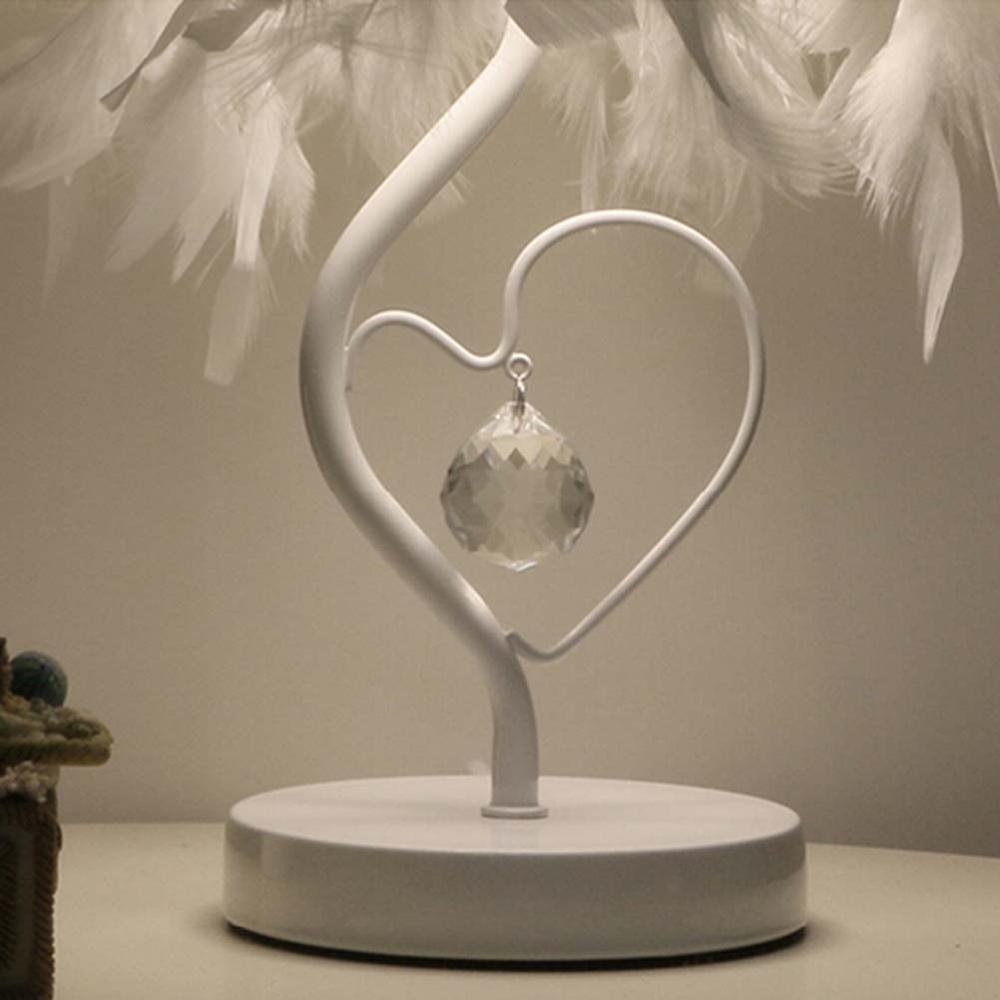 Lámpara de mesita de noche de cristal con alas de corazón y plumas LED