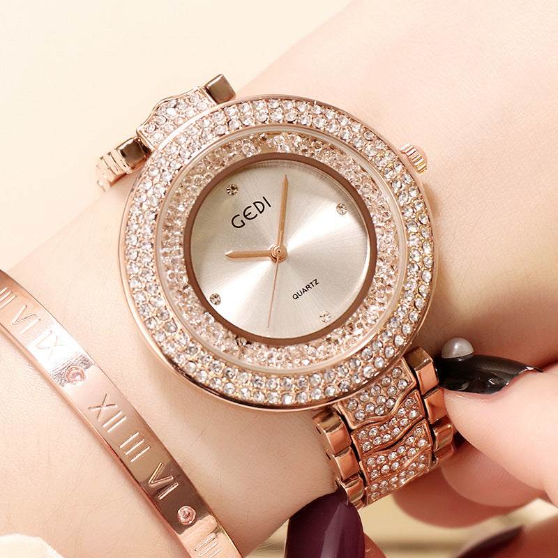 Reloj de mujer con correa de diamantes.