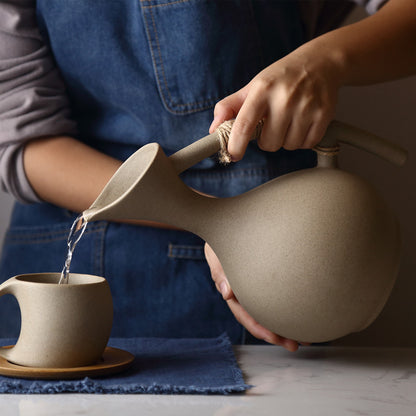 Ensemble de bouilloire froide en poterie saine