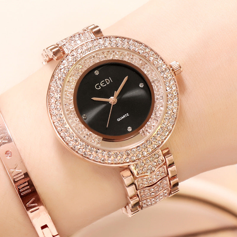 Reloj de mujer con correa de diamantes.