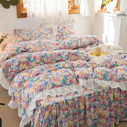 Juego de falda de cama versión coreana floral pequeña de cuatro piezas