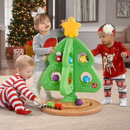 Árbol de Navidad giratorio con escena infantil, tren de juguete