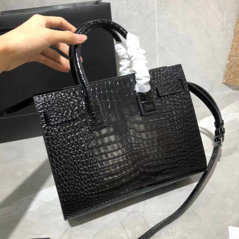 Sac à bandoulière enveloppe en cuir élégant