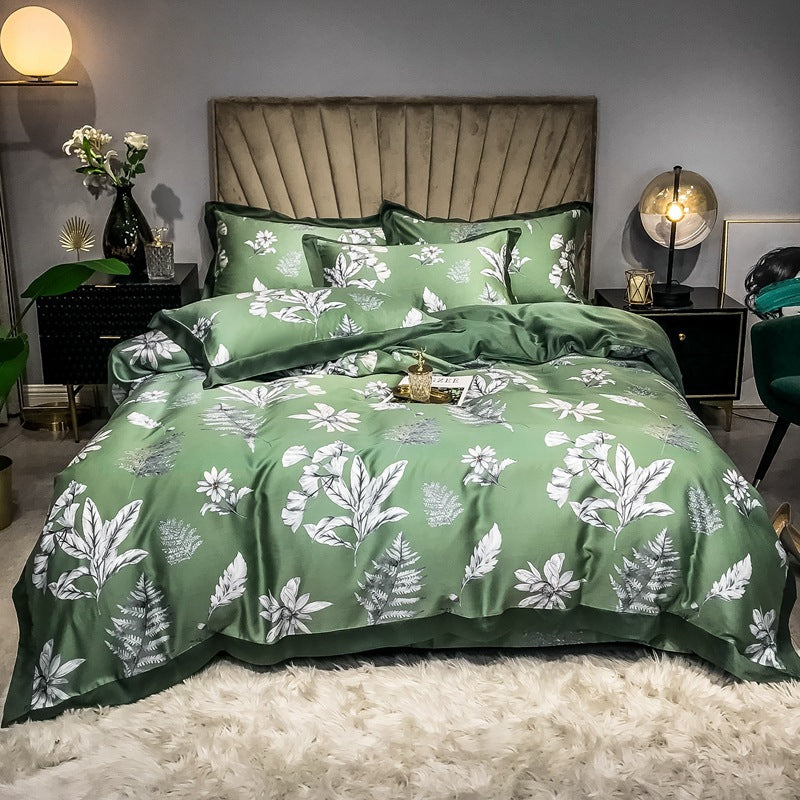 Juego de cama estampado de seda de doble cara de cuatro piezas con seda de hielo