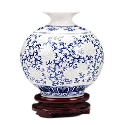 Vase décoratif chinois avec composition florale en porcelaine bleue et blanche