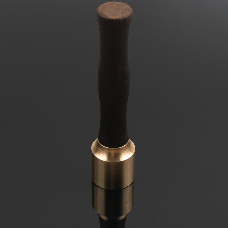 Small hammer with brass handle