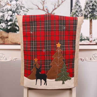 Funda de silla a cuadros con adornos navideños de bosque