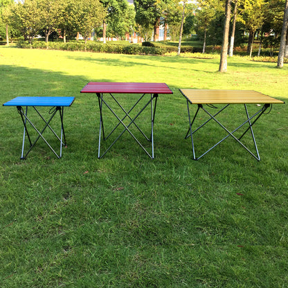 Montañismo al aire libre, mesa plegable de súper aleación, mesa de picnic portátil para acampar con barbacoa, trompeta simple, mini mesa al por mayor