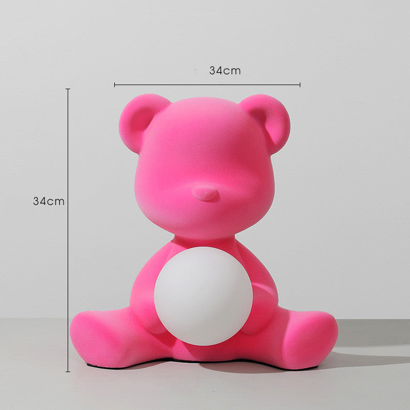 L'atmosphère d'anniversaire du petit ours est une belle lampe