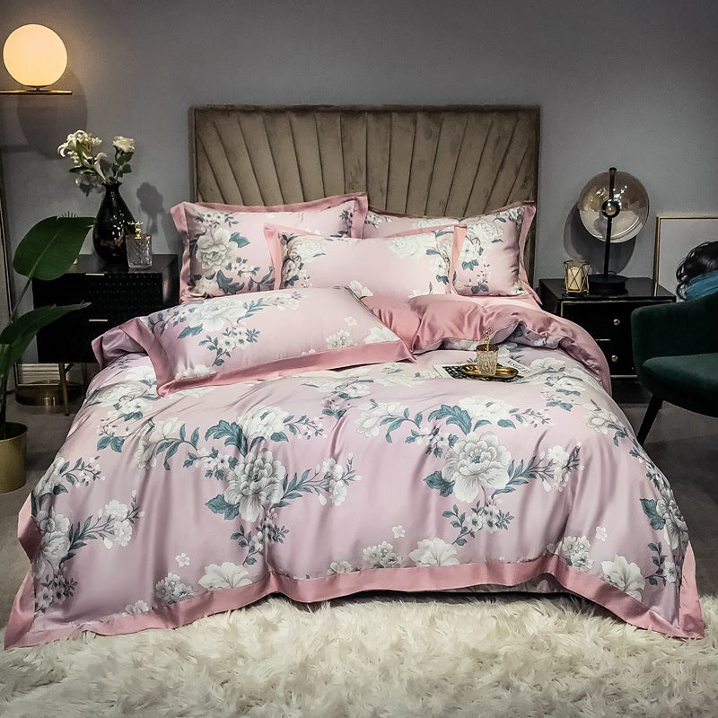 Juego de cama estampado de seda de doble cara de cuatro piezas con seda de hielo