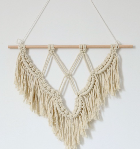 Décoration murale en macramé de style Boho