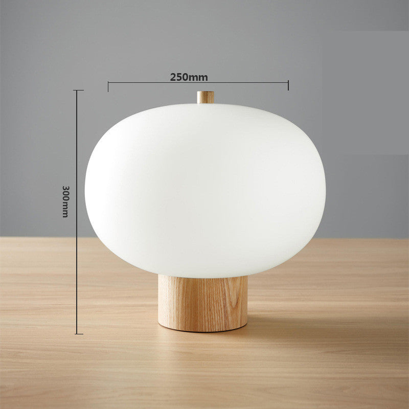 Lampe design boule de verre pour tenue douce de mariage