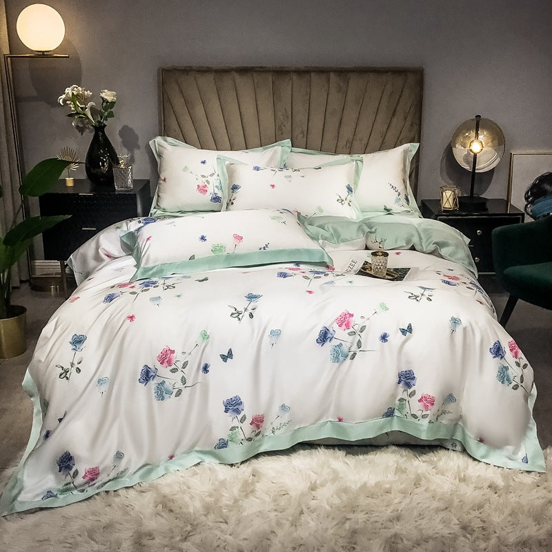 Juego de cama estampado de seda de doble cara de cuatro piezas con seda de hielo