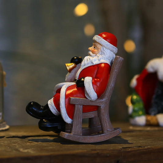 Le Père Noël sort des décorations de Noël pour le festival