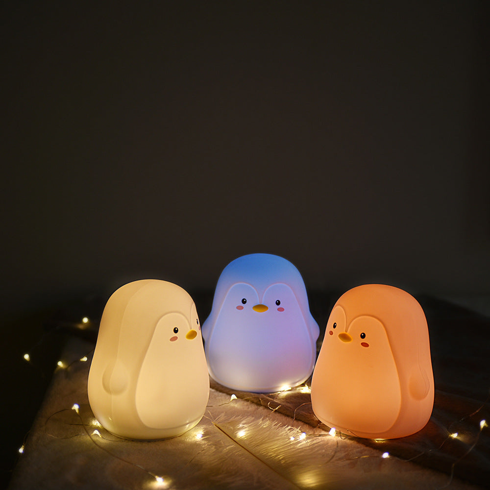 Luz nocturna de pingüino