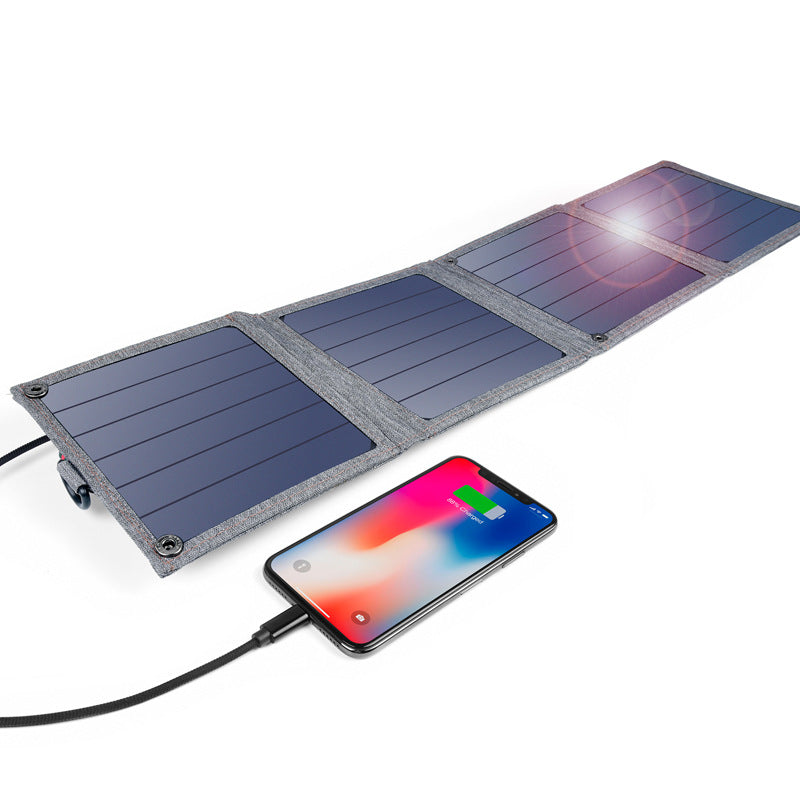 Cargador solar para tableta y teléfono móvil.