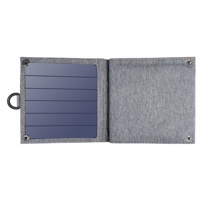 Cargador solar para tableta y teléfono móvil.