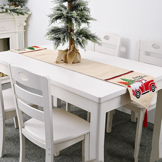 Camino de mesa con adornos navideños y diseño de coche de bosque para mesa de comedor