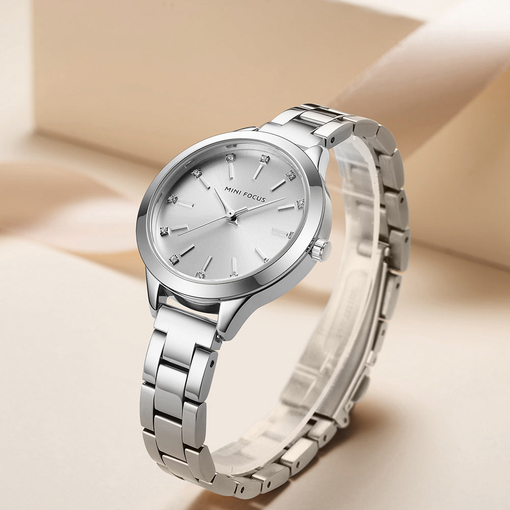 Montre simple étanche avec bracelet en acier massif et strass pour femmes