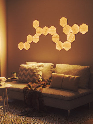 Mur de fond décoratif de panneau de lampe à grain de bois hexagonal