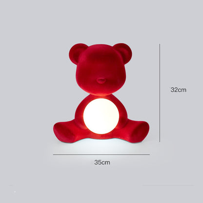 L'atmosphère d'anniversaire du petit ours est une belle lampe