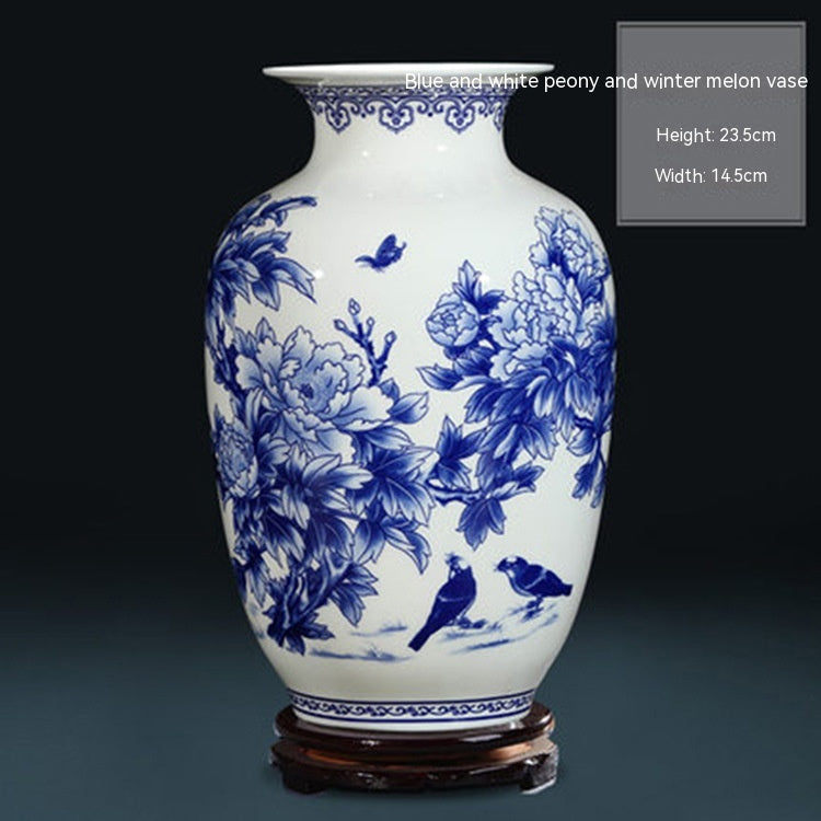 Vase décoratif chinois avec composition florale en porcelaine bleue et blanche