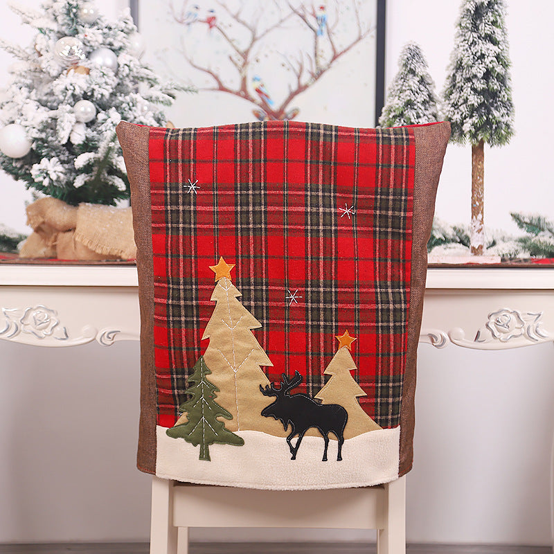 Funda de silla a cuadros con adornos navideños de bosque