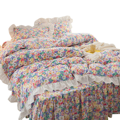 Juego de falda de cama versión coreana floral pequeña de cuatro piezas