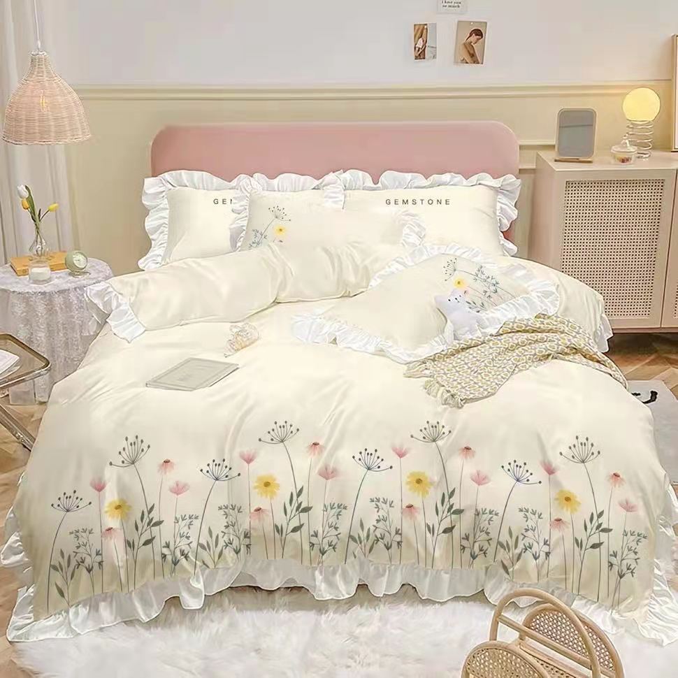 Housse de couette brodée en quatre pièces pour lit en coton lavé