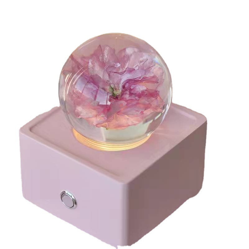 Altavoz Bluetooth con bola de cristal de resina y flor de cerezo