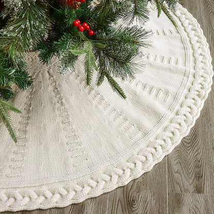 Falda de árbol de Navidad tejida con adornos rojos