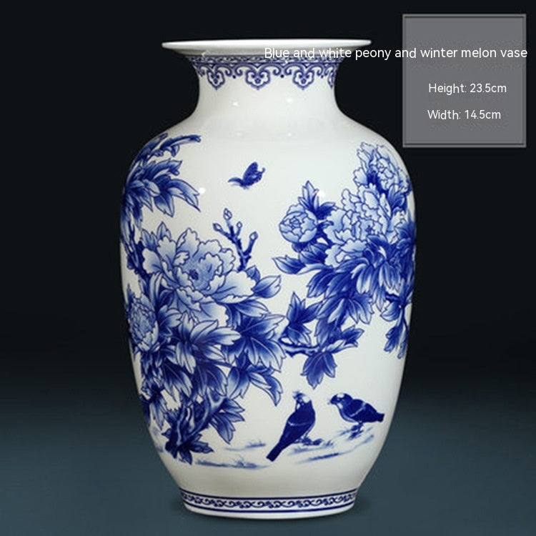 Vase décoratif chinois avec composition florale en porcelaine bleue et blanche