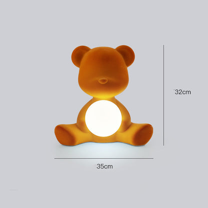 L'atmosphère d'anniversaire du petit ours est une belle lampe