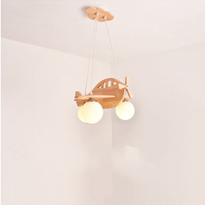 Lustre moderne minimaliste en forme d'avion dans la chambre des enfants